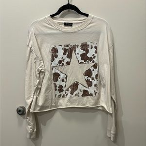 Small boutique cream cow print LS